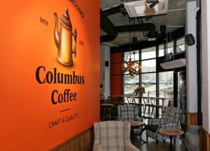 Columbus Coffee Garnizon naglosnienie kawiarni Apart Audio